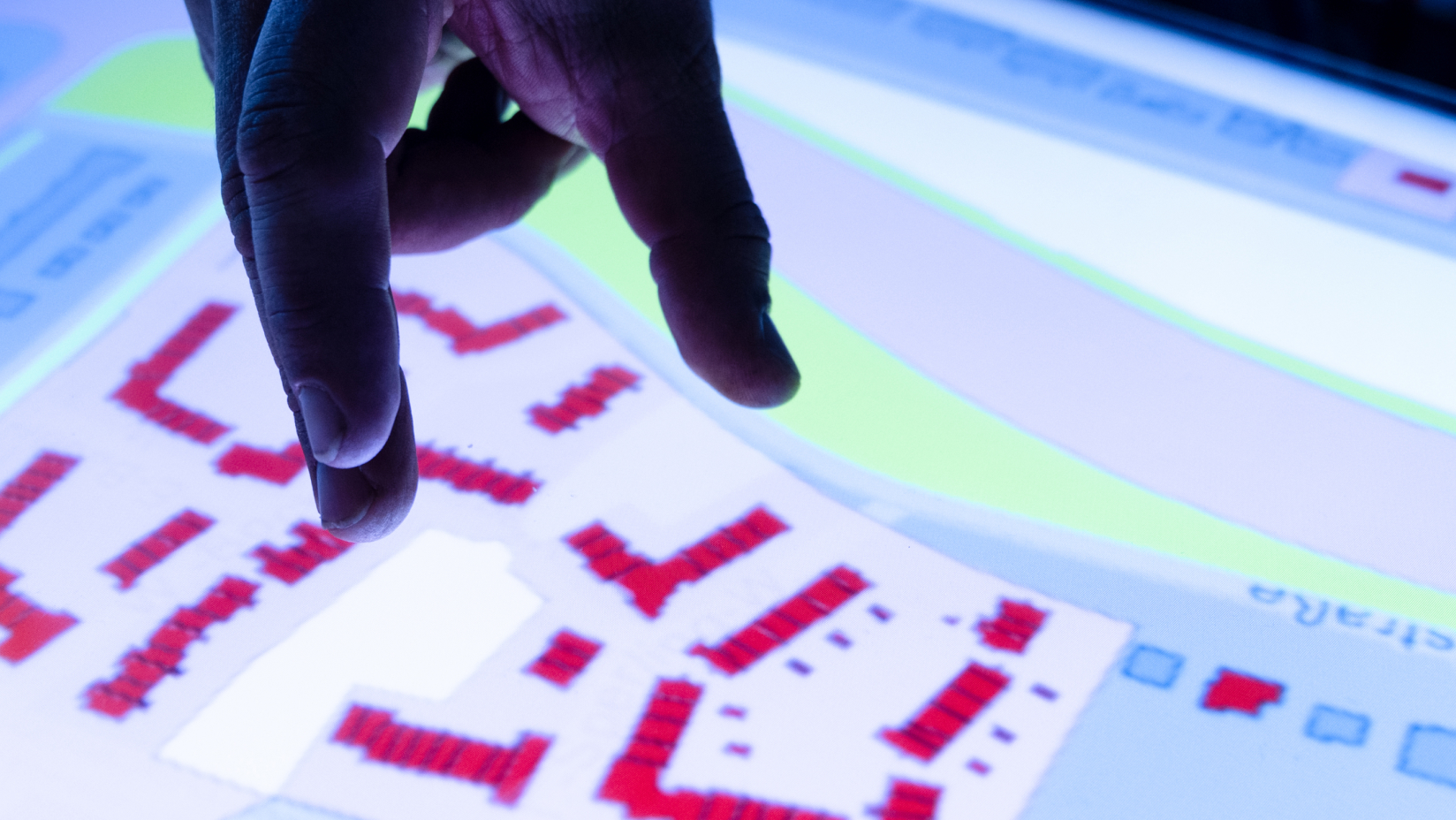 Close-up of a hand using the touchtable